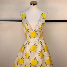 Brocade / Jacquard Dress With Fitted Waist And Full Skirt, Delicate Straps, Deep Plunge Neckline, Open Back, And Sunny Floral Print. Could Work As A Sundress Or A Summery Cocktail Dress. 1950s Vintage Aesthetic. 100% Polyester Self 100% Polyester Lining Yellow Mini Dress For Spring Wedding, Spring Wedding Yellow Mini Dress, Formal Yellow Floral Print Dress, Yellow V-neck Mini Dress For Formal Occasions, Formal Yellow V-neck Mini Dress, Yellow Floral Print Mini Dress For Cocktail, Deep Plunge, Rayon Pants, Floral Sundress