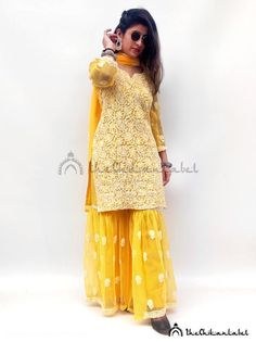 Thechikanlabel yellow chikankari salwar kameez lucknowi chikan Bollywood KurtaDisclaimer : : Motifs of embroidery may vary as the images shown are for illustration purpose.PRODUCT SPECIFICATIONSColor : Options AvailableFabric : GeorgetteSleeves : 3/4 SleevesStyle : Straight KurtiLength : Long LengthOccasions : Casual Wear, Office Wear, Party WearGarment Care : Hand Wash OnlyPackage Contains : Kurti + Salwaar + DupattaPRODUCT FEATURESFlawless finishingElegant looksAlluring patternsSkin friendlySh Yellow Festive Kurta With Chikankari Embroidery, Yellow Straight Kurta Anarkali Set With Chikankari Embroidery, Yellow Anarkali Set With Chikankari Embroidery, Straight Kurta, Yellow Chikankari Embroidery Sets For Diwali, Unstitched Yellow Kurta With Chikankari Embroidery, Yellow Chikankari Embroidered Straight Kurta, Yellow Anarkali Kurta With Chikankari Embroidery, Yellow Anarkali Traditional Wear With Chikankari Embroidery, Yellow Anarkali With Chikankari Embroidery