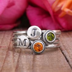 For Mother's Day, use your imagination and creative skills to design a personalized stacking ring for mom. Learn more here! Birthstone Ring Stack, Coach Ring, Mom Rings, Mother Ring, Mothers Rings, Initial Rings, Stackable Birthstone Rings, Mother's Ring, Birthstone Ring Mothers