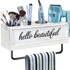 a white wooden holder holding makeup brushes and other items