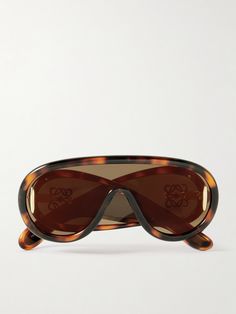 LOEWE Eyewear's sunglasses have oversized aviator-style frames reminiscent of ski goggles. They're set with tonal lenses throughout and feature the house's 'Anagram' logo at the temples. Fancy Sunglasses, Designer Aviator Sunglasses With Tinted Lenses, Designer Tinted Aviator Sunglasses For Summer, Luxury Tinted Aviator Sunglasses, Tortoise Aviator Sunglasses, Loewe Glasses, Loewe Sunglasses, Loewe Wave Mask Sunglasses, Summer Style Guide