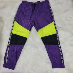 New Look Sports Women's Size Xl Purple Retro Pants. This Is Brand New With Tags. Size Xl Length: 38-1/4" Wait Across Front: 16-3/4" Inseam: 27-1/2" B7 Trendy Sports Sweatpants With Elastic Waistband, Green Athleisure Parachute Pants For Sports, Trendy Sports Joggers With Elastic Waistband, Purple Sweatpants For Spring Streetwear, Purple Athleisure Sweatpants With Elastic Waistband, Purple Bottoms With Elastic Waistband For Streetwear, Purple Athleisure Joggers With Pockets, Trendy Joggers With Elastic Waistband For Workout, Hip Hop Style Sports Bottoms With Elastic Waistband