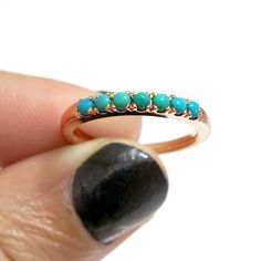 "Turquoise Ring, Bohemian Turquoise Wedding Ring, 14K Rose gold Turquoise Ring, Turquoise Ring for Women. This rose gold Turquoise ring is a beautiful way to say \"I love you.\" Handmade from 14 karats rose gold, this stacking ring features seven rounded bright blue turquoise gemstones. The 2 mm gemstones are almost flush with the 2.4 mm-wide band, creating a stunning pave effect. This beautiful accessory is available in any ring size. Give this ring as an anniversary gift to your beloved spouse Fine Jewelry Turquoise Multi-stone Ring, Turquoise Multi-stone Ring Fine Jewelry, Stackable Turquoise Ring Fine Jewelry, Stackable Turquoise Ring In Fine Jewelry Style, Turquoise Fine Jewelry Ring For Promise, Turquoise Wedding Ring, Gold Turquoise Ring, Turquoise Wedding Rings, Boho Wedding Ring