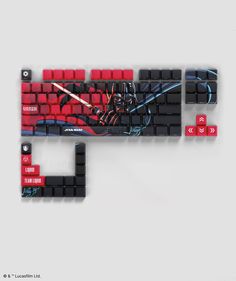 the star wars keyboard is made out of black and red plastic keys with darth vader on it