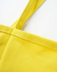 Details: High quality tote bag with label design Everyday Rectangular Canvas Bag With Adjustable Straps, Yellow Summer Shoulder Bag With Pockets, Spring Rectangular Canvas Bag With Pockets, Canvas Tote Bag With Adjustable Straps, Yellow Cotton Shoulder Bag For School, Trendy Yellow Cotton Shoulder Bag, Yellow Cotton Bags With Pockets, Yellow Cotton Shoulder Bag For Shopping, Trendy Yellow Rectangular Canvas Bag