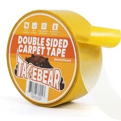 a roll of tape that is yellow and has a brown bear on the side of it