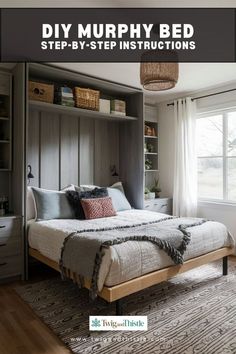 a bed sitting under a window next to a book shelf filled with books and pillows