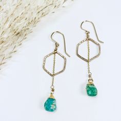 A brilliant pop of blue green drips from hand forged honeycomb hoops, creating a luxurious earring you will never want to take off. Dimensions: 2.25 x .75" 14k gold filled with rough chrysocolla gemstone Turquoise Hammered Dangle Earrings, Turquoise Hammered Dangle Jewelry, Turquoise 14k Gold Filled Earrings, Turquoise Hand Forged Drop Earrings, Luxury Earrings, Jewelry Repair, Hand Forged, Honeycomb, Semi Precious Gemstones