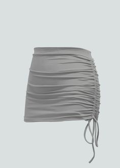 This stylish azure mini skirt combines bold design with a sleek silhouette, making it a standout piece in any wardrobe. Featuring a chic ruched detail along one side, this skirt offers a flattering, body-hugging fit that accentuates your curves. The adjustable drawstring allows you to customize the length, adding versatility and a touch of playful charm. Crafted from a soft, stretchy fabric, it provides comfort without compromising on style. Perfect for a night out or a casual day with friends, this ruched mini skirt adds a modern, vibrant touch to your ensemble. Pair it with a simple top and heels for a polished look or dress it down with a relaxed tee and sneakers for effortless cool. Pantyhose Skirt, Metallic Leotard, Romper Men, Kids Leotards, Ruched Mini Skirt, Metallic Bodysuit, Day With Friends, Leotard Dress, Long Sleeve Leotard