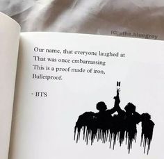 an open book with black and white illustrations on the page, which reads our name, that everyone tangled at that was once embracing this is a proof made of iron,