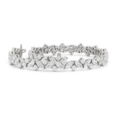 An absolute showstopper, this diamond tennis bracelet will have all eyes on your wrist. It features marquise diamonds and round diamonds arranged in a fanciful pattern to create a row of diamonds with gently undulating arches. This tennis bracelet is lovely on its own, but lovelier when worn with bangles and dainty chains. Luxury Marquise Tennis Bracelet For Women, Elegant Marquise Diamond White Tennis Bracelet, Luxury Marquise Bracelets With Brilliant Cut, Luxury Marquise Bracelet With Brilliant Cut, Marquise Tennis Bracelet For Wedding, Fine Jewelry, Infinity Pendant, Tennis Bracelet Diamond, Fancy Color Diamonds, Marquise Diamond