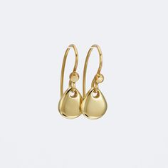 Classy and fine 14k gold dangle earrings, small yet eye catching. They are handmade of yellow 14k solid gold, and have a highly shiny finish. The smooth minimalist gold teardrops dangle and shine with every slight movement. These modern and feminine gold earrings are great to wear day or night, casual or dressy.  A wonderful gift for someone you love, and a treat for yourself. Total length of the earrings is 21 mm = approx. 0.8 inch Drop's height is 9 mm = approx. 0.35 inch Drop's width is 7.7 mm = approx. 0.30 inch Silicone ear backs are included for safety. * The earrings will be packed in a gift box ready to give as a gift, and shipped via Express mail service which usually takes 4-6 business days to arrive. * For more gold earrings click here: http://www.etsy.com/shop/SigalGerson?secti Minimalist Gold Drop Earrings With Matching Set, Modern Gold Teardrop Earrings In Sterling Silver, Minimalist Yellow Gold Drop Earrings, Modern Long Drop Yellow Gold Earrings, Polished Finish Yellow Gold Drop Earrings As Gift, Modern Gold Briolette Earrings, Gold Minimalist Teardrop Earrings With Lever Back, Gold Minimalist Sterling Silver Teardrop Earrings, Modern Gold Teardrop Earrings In 14k Gold