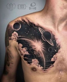 a man's chest with planets and stars on it