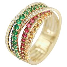 Ring Yellow Gold 14 K (Available in White Gold) Diamond 53-RND-0,13-G/VS2A Ruby 9-0,18ct Tsavorite 18-0,46ct Sapphire 14-0,37ct Multi Sapphire 20-0,47 ct Weight 5.54 grams Size 17 With a heritage of ancient fine Swiss jewelry traditions, NATKINA is a Geneva based jewellery brand, which creates modern jewellery masterpieces suitable for every day life. It is our honour to create fine jewelry, and it’s for that reason that we choose to only work with high-quality, enduring materials that can almos Yellow Gold Multi-stone Emerald Ring, Yellow Gold Tsavorite Ring, Green Sapphire Stackable Ring Fine Jewelry, Yellow Gold Multi-stone Emerald Ring With Round Cut, Tsavorite Gemstone Ring Fine Jewelry, Green Multi-stone Sapphire Diamond Ring, Fine Jewelry Green Sapphire Multi-stone Ring, Fine Jewelry Green Multi-stone Sapphire Ring, Anniversary Tsavorite Ring In Yellow Gold