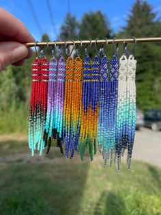 The sweetest little barrel earrings! Lightweight and fun to wear. Made with tiny size 15 Miyuki beads.  Medical grade stainless steel leverbacks - great for sensitive ears, won't rust or tarnish. Everyday Multicolor Earrings With Tiny Beads, Adjustable Beaded Earrings With Dangling Beads For Everyday, Nickel Free Long Drop Beaded Earrings, Adjustable Long Drop Beaded Earrings, Nickel Free, Nickel-free Adjustable Long Drop Beaded Earrings, Nickel Free Adjustable Long Drop Beaded Earrings, Adjustable Long Drop Nickel Free Beaded Earrings, Everyday Earrings With Dangling Round Beads, Adjustable Multicolor Earrings With Lever Back