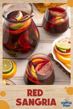 red sangria in pitchers with slices of lemon and lime