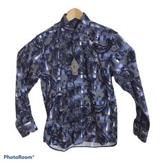 Visconti Black Men's Long Sleeve Multi Color Blue All Over Paisley Pattern, Cotton With A Flocked Textured Feel In The Paisley Areas. Spread Collar. Size Small. Dry Clean Only. Msrp $145.00. Now Lower Flat Rate Shipping Charges. Blue Paisley Print Long Sleeve Shirt, Designer Blue Long Sleeve Top, Patterned Long Sleeve Formal Shirt, Formal Long Sleeve Patterned Shirt, Formal Long Sleeve Printed Shirt, Printed Long Sleeve Shirt For Formal Occasions, Blue Long Sleeve Dress Shirt For Fall, Patterned Long Sleeve Business Shirt, Patterned Long Sleeve Shirt For Business