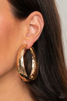 Hammered in blinding shimmer, a thick gold hoop curls into a gritty-glamorous display for an exaggerated attitude. Earring attaches to a standard post fitting. Hoop measures approximately 2 1/2" in diameter.

 Sold as one pair of hoop earrings. Thick Gold Hoops, Oversized Hoop Earrings, Classy Earrings, Hammered Hoop Earrings, Paparazzi Accessories, Fancy Jewelry, Paparazzi Jewelry, Chic Accessories, Jewelry Inspo