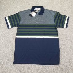 NEW Knights Club Size Large L Mens Polo Shirt Short Sleeve Striped Navy Blue Green White Logo Embroidered Cotton Blend. Condition is New with tags. Shipped Standard. See Photos With Measurements Green Polo Shirt With Striped Collar And Short Sleeves, Green T-shirt With Three Stripes Branding For Sports, Blue Polo Collar T-shirt For Sports Events, Green Short Sleeve T-shirt With Contrast Stripes, Team-colored Short Sleeve Polo Shirt For Sports, Green Stripes, Logo Embroidered, Casual Button Down Shirts, Navy Blue