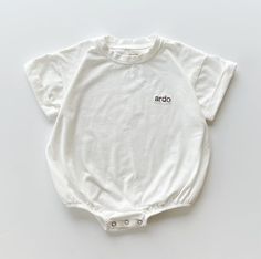 Short Sleeve Bubble Romper White Personalized Customized - Etsy Embroidered Bubble Romper, Organic Cotton Short Sleeve Onesie For Playwear, Organic Cotton Playwear Onesie, White Casual Relaxed Fit Onesie, White Relaxed Fit Casual Onesie, White Short Sleeve Onesie For Spring, Cute White Organic Cotton Tops, White Unisex Short Sleeve Onesie, White Short Sleeve Summer Onesie