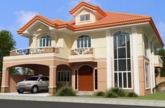 a car is parked in front of a two story house with an orange roof and white trim