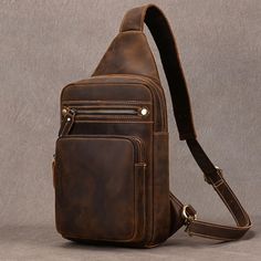 High Quality Big Chest Bag - Features & Qualities Material: 🐄 Cowhide Full Grain Leather: Made from the highest quality leather for durability and style. ✨ Handmade: Each bag is meticulously crafted by skilled artisans, ensuring a unique and high-quality piece. Design & Functionality: 📏 Dimensions: 38cm (15 inches) height, 20cm (7.9 inches) width, and 7cm (2.8 inches) depth. ⚖️ Lightweight: Weighs only 0.6kg (1.3 lbs), making it easy to carry around all day. 📐 Spacious: Multiple compartments Leather Sling Bag Men, Sling Bag For Men, Chest Pack, Hiking Bag, Utility Bag, Leather Sling Bag, Vintage Leather Bag, Canvas Messenger Bag, Mens Leather Bag