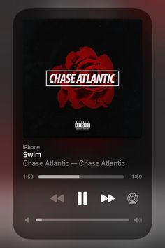 an audio player with the words chase atlantic on it's screen and headphones