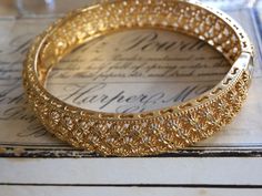 Stunning decorative vintage 1970s 18ct gold plated hinged bangle/bracelet...the lovely bracelet opens up, see photo, to fit onto your wrist and is in splendid condition..measuring 6.5cm in diameter x 2cm in depth...the box is for display, however the fabulous vintage gold bracelet will arrive beautifully gift wrapped xx Vintage Gold Bracelet, Gold Armband, Gold Plated Bangles, Vintage Bangles, Hinged Bangle, Gold Style, Vintage 1970s, Bangle Bracelet, Vintage Gold