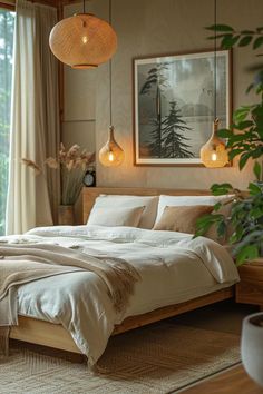 a large bed sitting in a bedroom next to a window with hanging lights above it