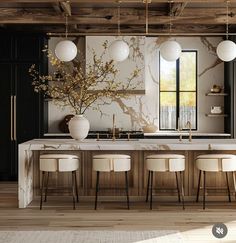 an elegant kitchen with marble counter tops and white stools in front of the island