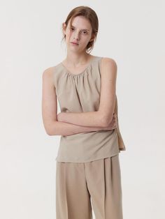 Republic of Korea Chic Beige Viscose Tops, Chic Taupe Tops For Spring, Spring Taupe Tops For Workwear, Elegant Khaki Tops For Spring, Beige Viscose Tops For Summer, Elegant Neutral Tops For Daywear, Beige Viscose Summer Blouse, Summer Beige Viscose Blouse, Classic Beige Tops For Spring