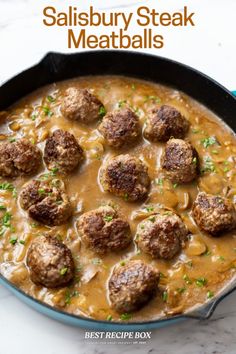 meatballs and gravy in a skillet with the words salisbury steak meatballs