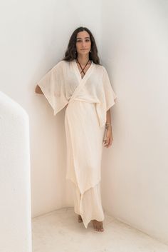 Juliette is our coziest dress and cover up You have up to 3 ways to close it and it is what make this dress perfect for your beach days The tie dye versions are subject to variations as are hand dyed 100% natural cotton V-neck Maxi Dress With Natural Dye For Summer, Breezy Maxi Dress For Loungewear, Breezy Maxi Length Dress For Loungewear, Summer Cotton Gauze Loungewear Dress, Summer Cotton Gauze Lounge Dress, Summer Cotton Gauze Dress For Loungewear, Casual Linen Wrap Dress For Beach, Beige Wrap Beach Dress, Beach Wrap Linen Dress