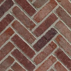 an image of a brick wall that looks like it is made out of red bricks