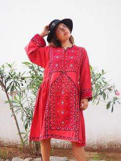 Vintage 1970’s Pakistán hand embroidered red and black Kaftan dress With tiny detailed hand embroidery. In mint condition Size medium would fit size uk 8-12 Red Long Sleeve Dress With Traditional Patterns, Red Long Sleeve Dresses With Traditional Patterns, Folk Style Tunic Dress With Resham Embroidery, Festive Bohemian Embroidered Red Dress, Festive Red Bohemian Embroidered Dress, Traditional Red Tunic Dress, Red Embroidered Tunic Dress, Red Folk Embroidered Dress With Floral Design, Folk Style Red Long Sleeve Dress