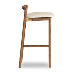 a wooden bar stool with a white cushion on the seat and backrest, against a white background