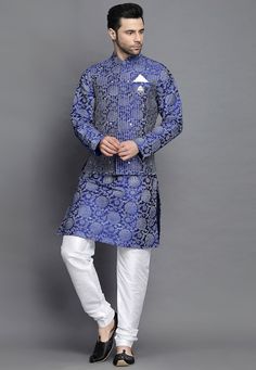 Art Silk Kurta in Royal BlueThis Readymade attire is Enhanced with Block Print and Resham Work. Crafted in Chinese Collar Neck and Full SleeveAvailable with an Art Silk Churidar in White and an Art Silk Nehru Jacket in Royal BlueDo note: Brooch and Footwear shown in the image is for presentation purposes only. Half to one inch may vary in measurement. (Slight variation in actual color vs. image is possible) We sell all kinds of menswear. Mens Kurta | Mens Kurta Pajama | Mens Sherwani | Mens Sher Traditional Blue Bandhgala For Spring, Royal Blue Fitted Kurta, Blue Traditional Long Sleeve Sets, Traditional Blue Long Sleeve Sets, Blue Long Sleeve Bandhgala For Spring, Transitional Embroidered Blue Nehru Jacket, Royal Blue Kurta For Festive Occasions, Blue Long Sleeve Kurta For Festivals, Blue Long Sleeve Kurta For Winter