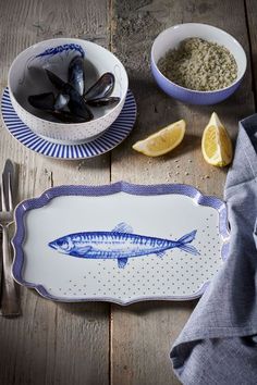 there is a plate with a fish on it