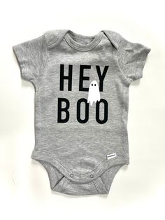 Hey Boo Onesie | Halloween Onesie | Cute Ghost Onesie | Halloween Kids T shirt | First Halloween Toddler Kids | Hey Boo | Halloween Baby by TinyNative on Etsy Funny Fitted Black Onesie, Playful Black Short Sleeve Onesie, Fitted Short Sleeve Fun Bodysuit, Fun Fitted Short Sleeve Bodysuit, Fitted Short Sleeve Bodysuit With Cartoon Print, Playful Short Sleeve Bodysuit With Character Print, Funny Graphic Print Short Sleeve Bodysuit, Cute Cotton Halloween Bodysuit, Fitted Halloween Onesie For Playtime