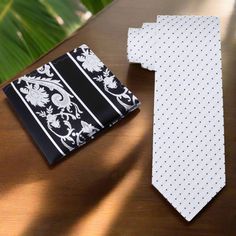 This classic silk necktie features a timeless pattern of small black dots on a crisp white background. The minimalist design offers a sophisticated and versatile accessory that can seamlessly transition from business to social settings. The high-quality silk fabric provides a smooth texture and a subtle sheen, making this tie an essential addition to any formal wardrobe. Dress Shirts White Dress Shirt: A white dress shirt creates a clean and monochromatic look, allowing the small black dots to s Brown Bow Tie, Grey Bow Tie, Yellow Bow Tie, Purple Bow Tie, Polka Dot Bow Tie, Tie Matching, White Bow Tie, Plaid Bow Tie, White Dress Shirt