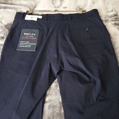 Size: 33waist 30inseam Color: Navy Blue Fitted Blue Pants With Hip Pockets, Fitted Blue Bottoms With Hip Pockets, Tommy Hilfiger Tapered Leg Bottoms With Pockets, Tommy Hilfiger Straight Leg Pants With Welt Pockets, Tommy Hilfiger Tapered Leg Pants With Pockets, Classic Tommy Hilfiger Tapered Leg Bottoms, High Waist Fitted Work Pants With Welt Pockets, Fitted High Waist Work Pants With Welt Pockets, Tommy Hilfiger Blue Straight Leg Bottoms