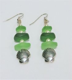 Green Sea-glass Pearl Earrings - Silver Pierced sea glass bead earrings, shades of green tumbled glass, with 3 white pearls and silver shell clear glass top bead Gorgeous colored glass, smooth as silk weighted perfect. ask for different ear wire, leverback, french wire, or post , or clip Green Jewelry With Matching Earrings For The Beach, Elegant Green Beaded Earrings For Beach, Elegant Green Earrings For Beach, Green Beaded Jewelry With Recycled Glass, Green Beaded Jewelry From Recycled Glass, Green Beaded Jewelry In Recycled Glass, Green Dangle Earrings With Recycled Glass, Green Sea Glass Earrings For Gift, Green Dangle Earrings In Recycled Glass