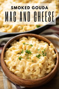 a wooden bowl filled with macaroni and cheese