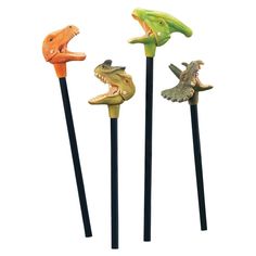 four different colored alligator heads on top of three black sticks, one is orange and the other is green