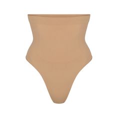 Wear this perfectly stretchy, shapewear high-waisted thong for a flat tummy and cinched waist without bulk or panty lines. Features a high waist fit that hits right below the bust, an interior silicone underband to prevent roll-down, a cotton gusset, and a wide crotch for added coverage. Fits true to size. | SKIMS High-Waisted Thong | Medium Neutral | Seamless Sculpt High Waist Seamless Swimwear Shapewear, Seamless High Waist Shapewear Swimwear, High Cut Seamless Swimwear, High-waist Sculpting Bottoms With Seamless Construction, High Waist Sculpting Bottoms With Seamless Construction, High Waist Sculpting Seamless Bottoms, Beige High-cut Leg Shapewear With Medium Bust Support, Sculpting High-waist Bottoms With Seamless Construction, Seamless Sculpting Elastane Bottoms