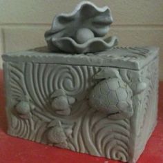 an image of a box that is made out of clay