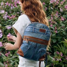 Myra Bag Janesa Denim Backpack Bag Nwt An Old Pair Of Jeans Comes Back To Life In The Super Cute Denim Backpack From Myra Bag. Awesome For Back To School, Your Next Travel Excursion, Festivals Or Everyday. Medium To Light Wash Blue Denim With Fading Tan Leather Accents Zip Front Pocket Zip Top Closure Leather And Denim Combo Adjustable Straps Tab Handle Lined Interior With Zipper And Slip Pockets Width 12.5 Depth 4 Height 15 Handle Drop 3.5 Nwt Boho, Bohemain, Festival, Western, Blue Jeans, Hippie, 70's, Retro, Light Academia, Preppy, Balletcore, Nerdy, School Girl, Classic, Timeless, Preppy, Intellectual, Sophisticated, Elegant, Refined, Nostalgic, Collegiate, Academic, Literary, Cozy, Mochila Jeans, Backpack Ideas, Concealed Carry Bags, Leather And Denim, Boho Backpack, Denim Backpack, Denim Bags, Retro Light, Convertible Crossbody Bag