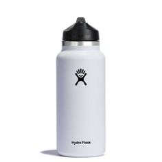 the hydro flask water bottle is white and has a black lid with a logo on it