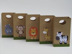 four brown bags with animals on them are lined up in the shape of an animal bag