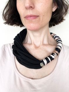 "Striking, cool and very soft necklace made with two kinds of fabric, one solid color and the other with a beautiful abstract print. What I like of this design is that you can wear it all year round. 10% OFF here > http://eepurl.com/damm-L * Length - 18 cms = 7\" app. * Color - Black and abstract print. * Material - 100% peruvian cotton jersey and spandex fabric. Care instructions: * Handwash your bnn necklace using cold / lukewarm water and mild detergent. * To remove stains, gently knead the w Wet Necklace, Soft Necklace, Fuchsia Necklace, Leather Statement Necklace, Neon Necklace, Neon Bracelets, Necklace Fabric, Ivory Necklace, Vintage Jewelry Diy